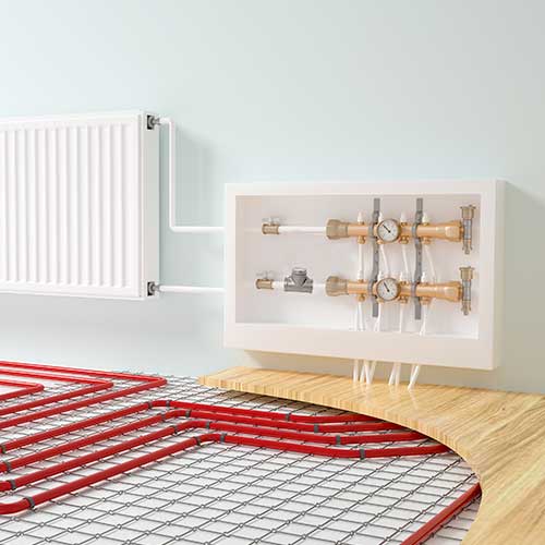 Circuit de chauffage avec plancher chauffant et radiateur, sur lequel est installé un système VitalQuartz.